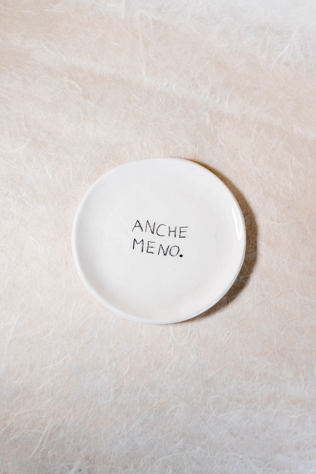 Piattino con frase effetto matita