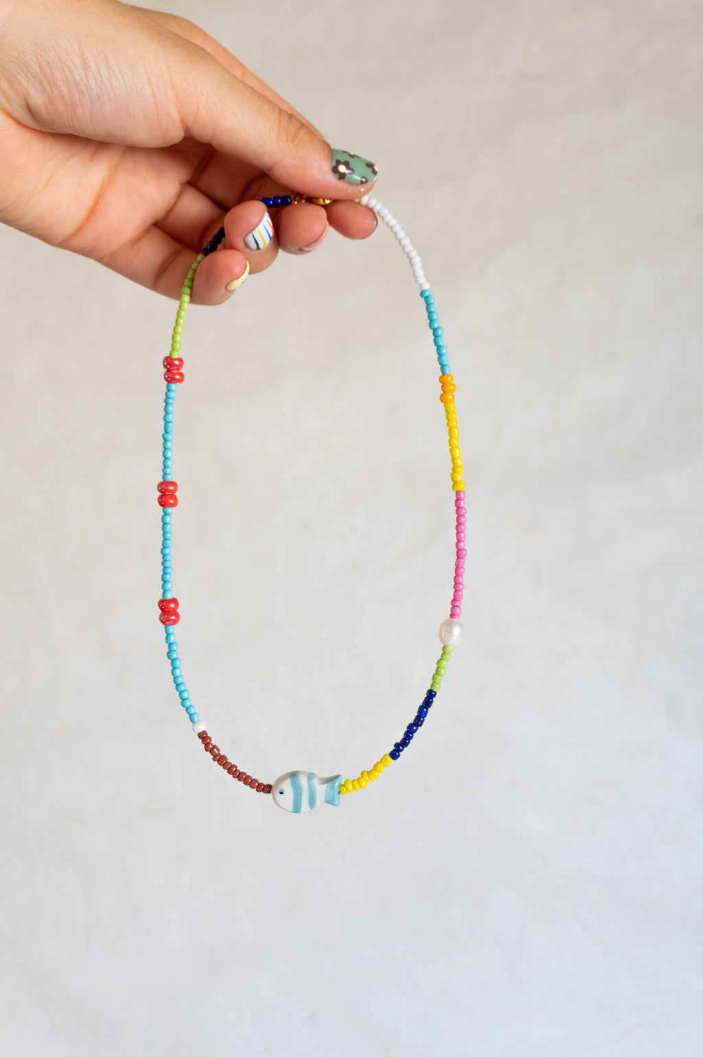Collana con pesciolino turchese
