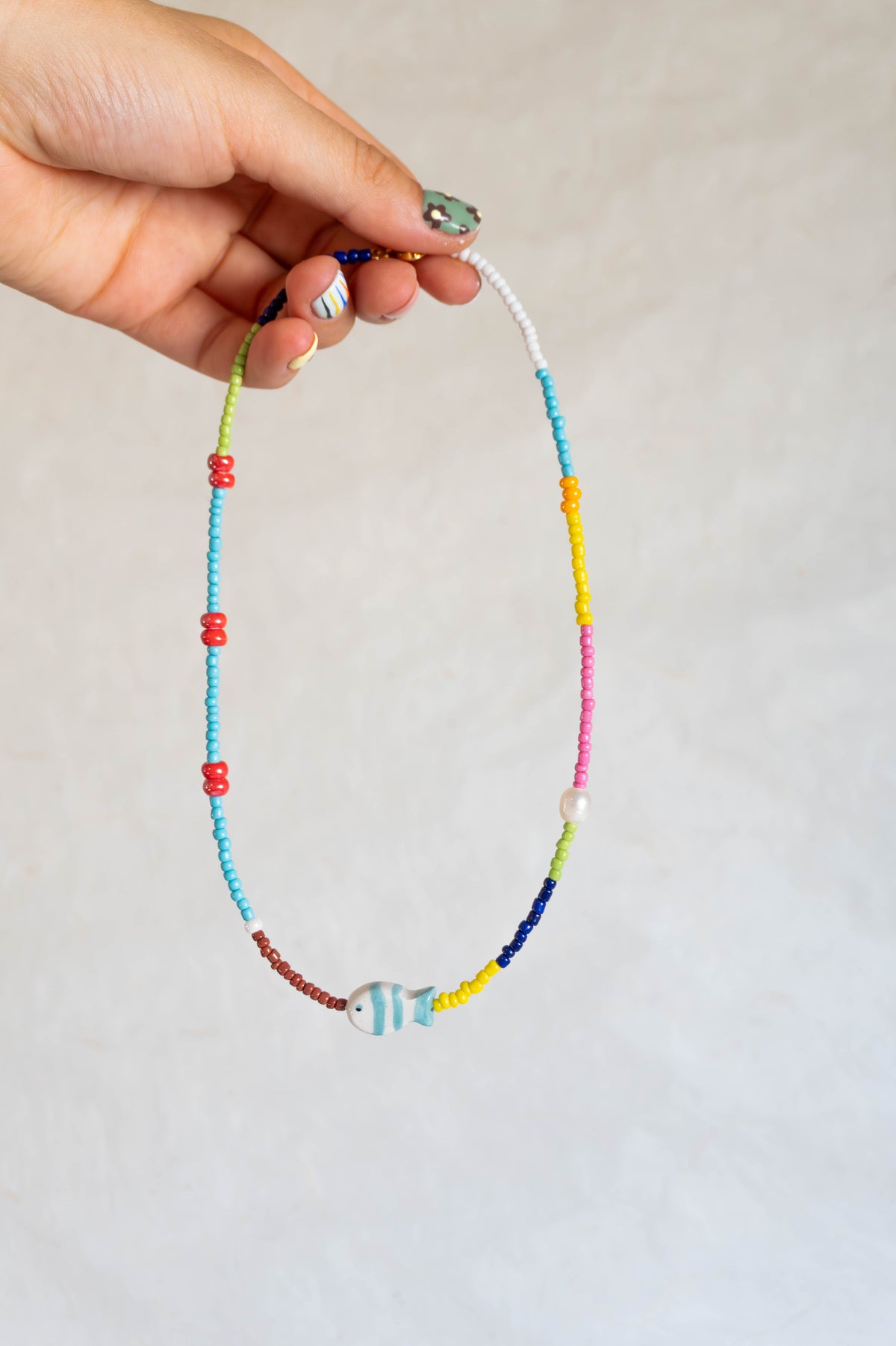 Collana con pesciolino turchese