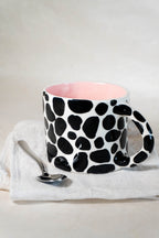 Tazza da latte muccata